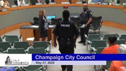 Mayor, Police Chief stand in center of Council Chambers as a police officer walks up to take his oath.