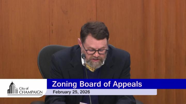 Zoning Board of Appeals Board Member speaking at Dias.